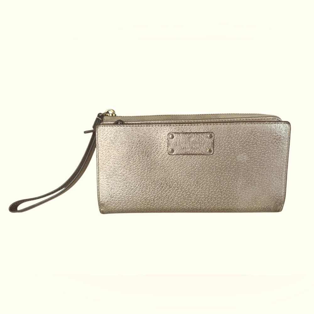 Kate Spade Gold Wristlet Clutch.